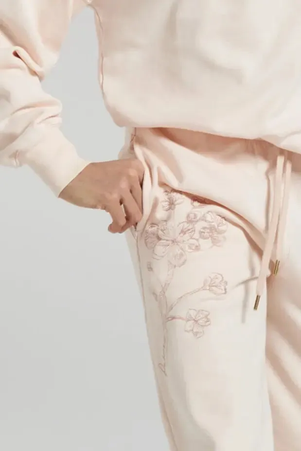 Sitka Blossom-Embroidered Ethical-Cotton Joggers - Shoreline Peach
